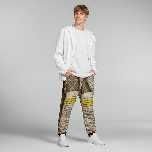 Golden Scripture – Unisex Track Pants The Golden Scripture track pants extend the sacred design with intricate detailing. Comfortable yet refined, they are designed to be worn as a striking set or a standalone statement. John 8:12 - Unisex Track Pants